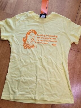 KTM Yellow retro housewife graphic and the KTM brand logo